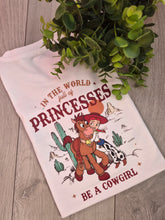 Load image into Gallery viewer, Princess be a cowgirl Adults and Childs Tee
