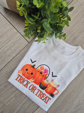 Load image into Gallery viewer, Trick or Treat Adults and childs tee
